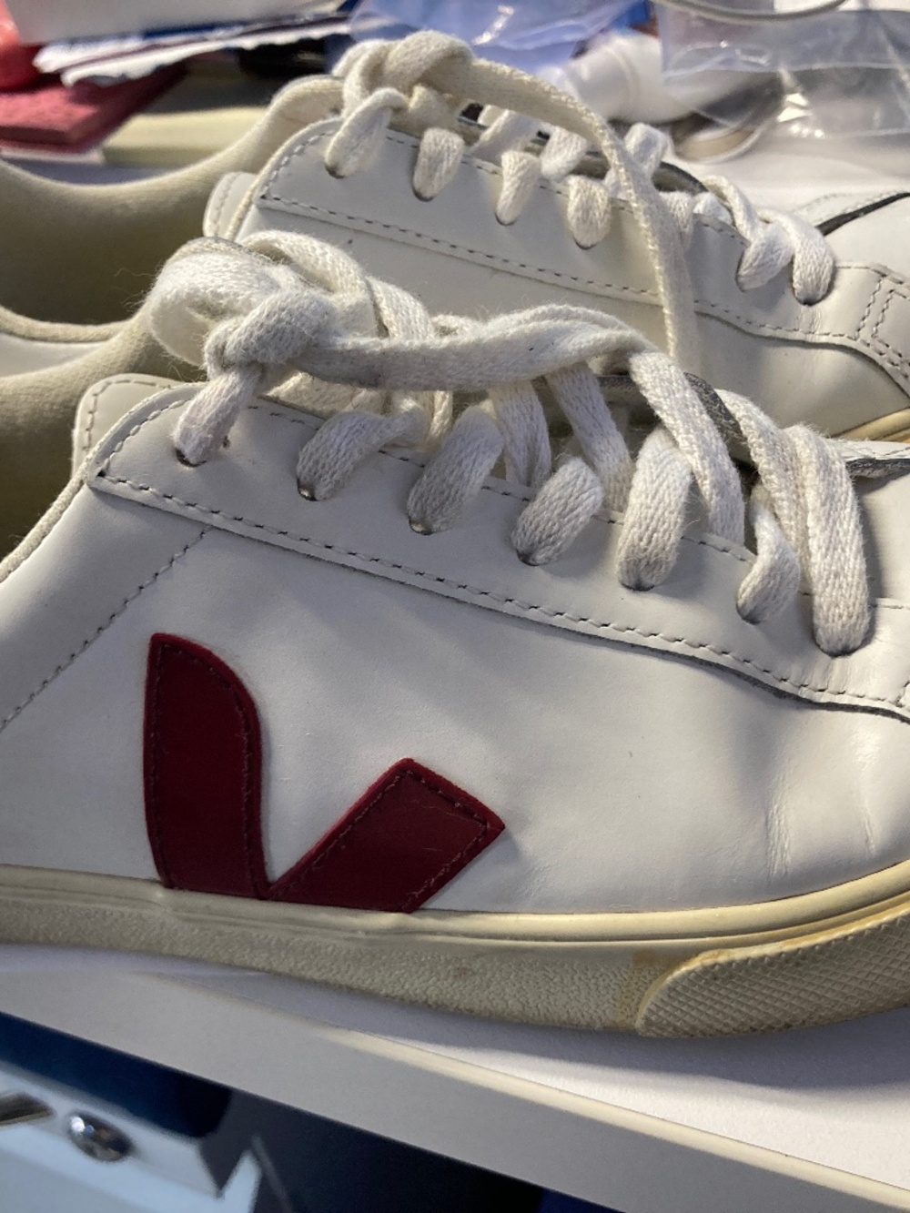Like new very clean size 7 Veja genuine leather white sneakers with maroon tail
